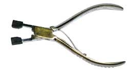 528.jpg Pince pour sertir les cavaliers plastiques